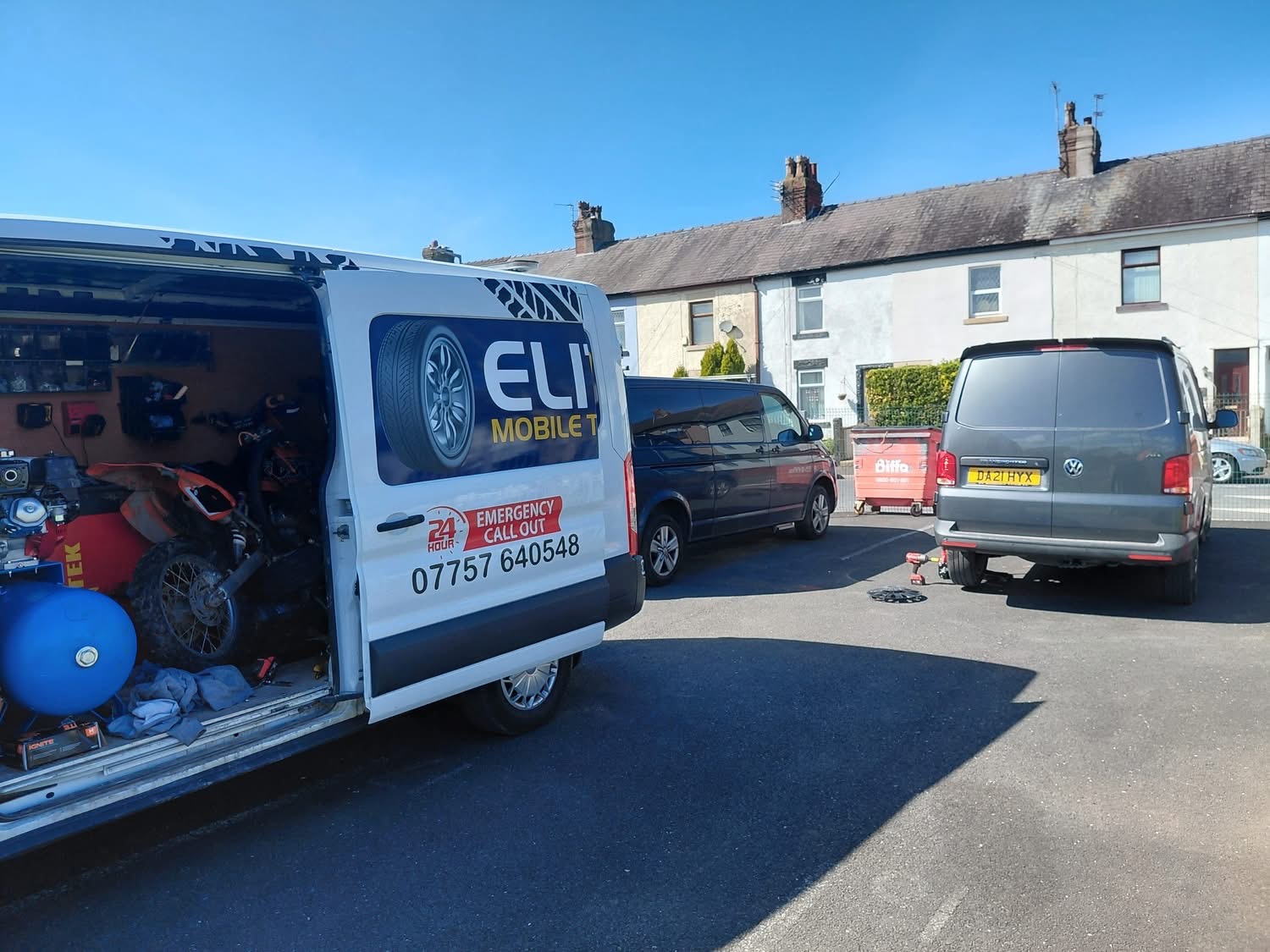 Inside an Elite Mobile Tyre Service van showing the fully equipped mobile tyre fitting workshop with tools, balancer and tyre stock