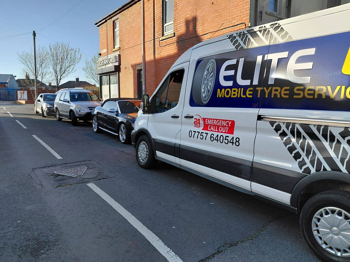 Commercial van attending a flat tyre.