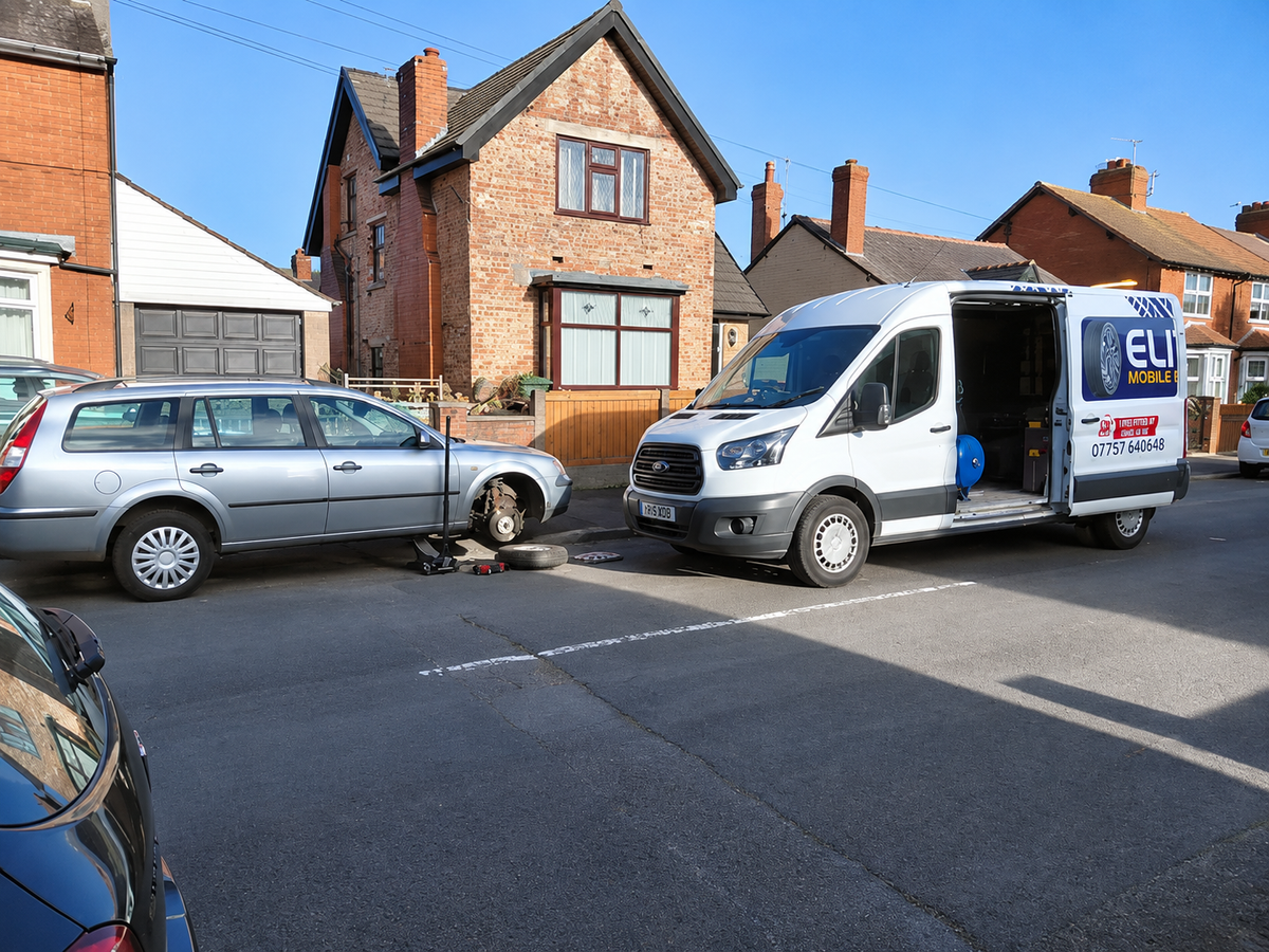 Mobile Tyre Service van assisting a broken down car.